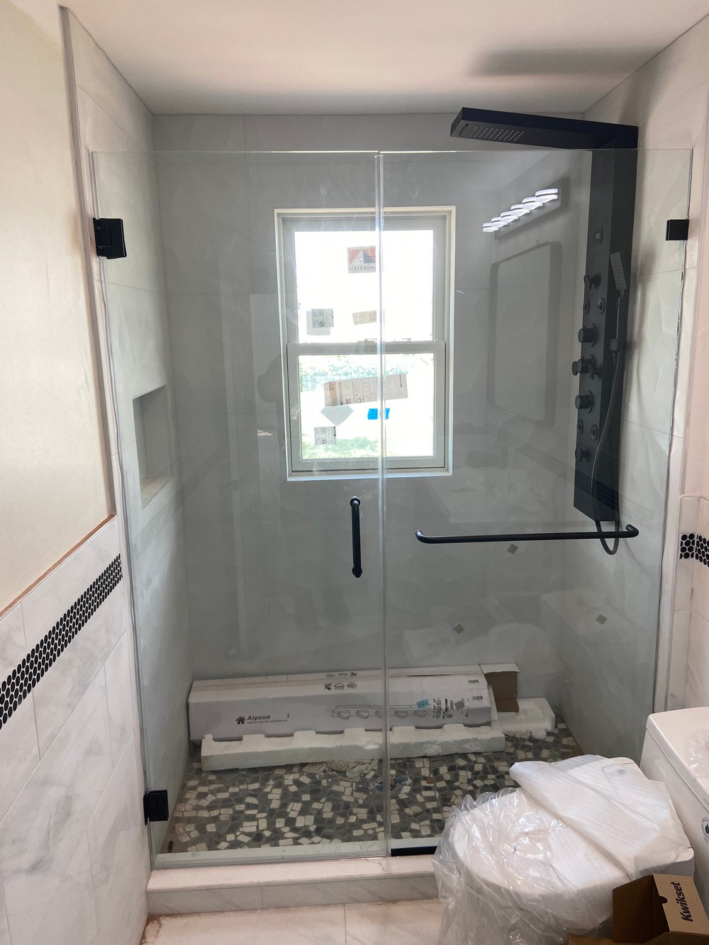 Perfect Inline Frameless Shower Door with a Notch Panel in Paterson, NJ