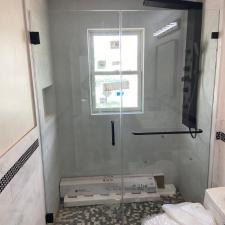 Perfect-Inline-Frameless-Shower-Door-with-a-Notch-Panel-in-Paterson-NJ 0